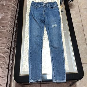 Levi’s blue 711 skinny distressed jeans